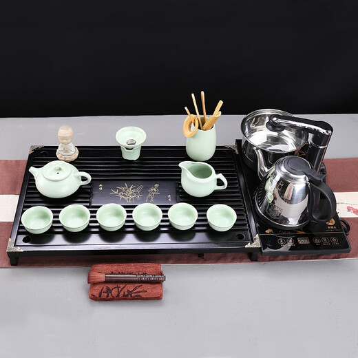 Gold inlaid jade Kung Fu tea set with solid wood tea tray for home office fully automatic water boiling electric tea stove elegant stone ladle