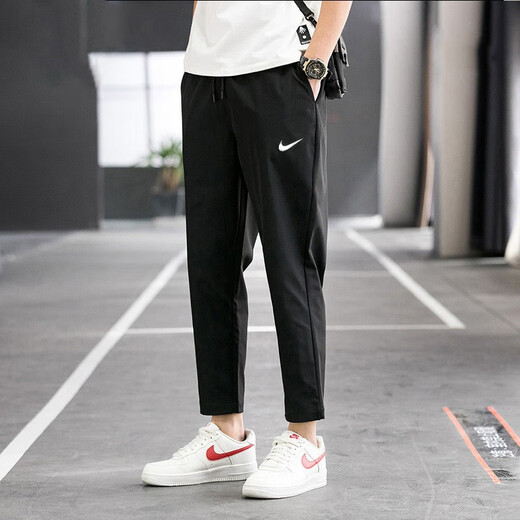 耐克（NIKE）官方网舰店男裤子 春新款运动裤长裤时尚卫裤舒适快干休闲裤男 DM6627-010/快干/白勾 S