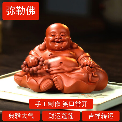 Yixing purple clay tea pet sculpture by famous pottery artist Fingertips Maitreya Buddha in a cloth bag Fully handmade tea play with little monks that can be raised and change color boutique Maitreya Buddha always smiles