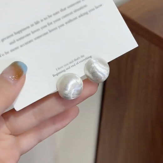 Weici sterling silver new style 9999 earrings brushed round ball earrings women's niche design high-end earrings 2025 new silver brushed round ball earrings A1312