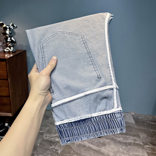 
New summer style men's loose elastic small feet long jeans men's trendy elastic belt iron-free casual harem pants 6623 light blue thin style 29 (recommended 105-120Jin [Jin equals 0.5 kg])