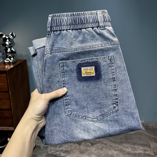
New summer style men's loose elastic small feet long jeans men's trendy elastic belt iron-free casual harem pants 6623 light blue thin style 29 (recommended 105-120Jin [Jin equals 0.5 kg])