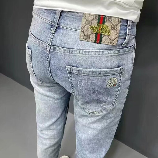 Jeans bordados de moda xcfreht Manteneros bordados Pantalones de pies delgados de estilo coreano para hombres de color