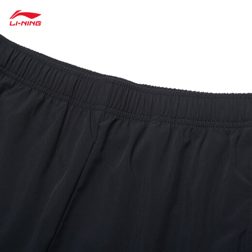 Li Ning Sports Shorts de secado rápido para hombres Corrientes de verano Fitness Entrenamiento de fitness Simple Sports Pants Fitness Clothing [Modelos de secado por secado 693] Black-1 S