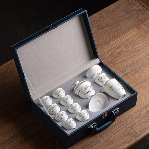 Gold inlaid jade Kung Fu tea set, complete set of home mutton fat jade porcelain drinking tea, tea gift box, high-end ink mountains and seas