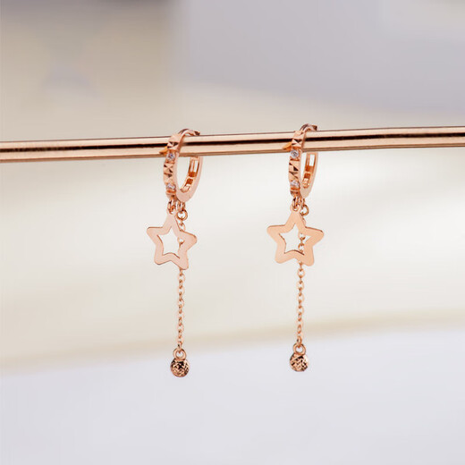 Made with love by the old Phoenix Gold Store in Sanskrit, colored gold earrings for women, 18k rose gold earrings, star earrings, earrings, a pair of rose gold earrings in stock