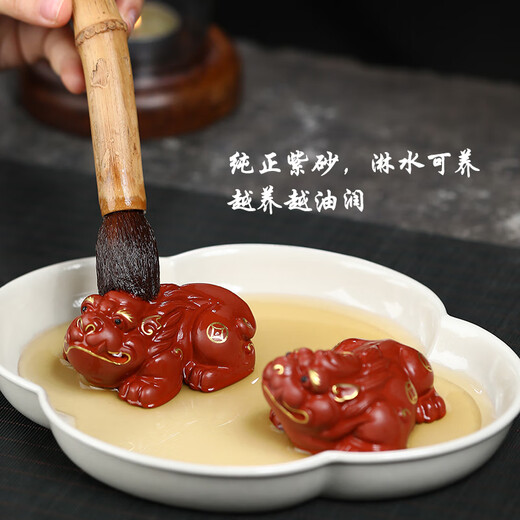 Yuyige gift-giving product Yixing purple clay tea pet ornaments can be raised with handmade original ore Dahongpao gold-painted pair of small Pixiu gold-painted Pixiu