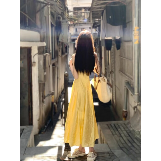 Robe jaune de style doux xier pour femmes sur la plage de style vacances à suspension jupe atmosphère en jupe tempérament A-line jupe longue jaune l