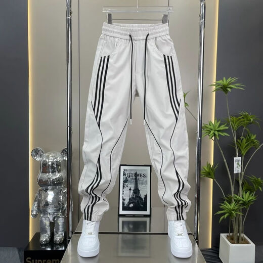 Pantalones de Harén casuales de rayas delgadas de verano de Fertisson Meng para hombres para niños para niños sueltos y modernos corbatas versátiles para hombres 683 Black + Off-White (2 tiras) 33 (recomendado 145-160Jin [Jin equivale a 0.5 kg])