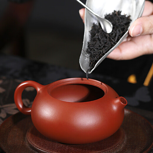 Centenary Liyong Yixing purple sand pot pure handmade raw ore Dahongpao flat Xishi pot Kung Fu tea set 185ml
