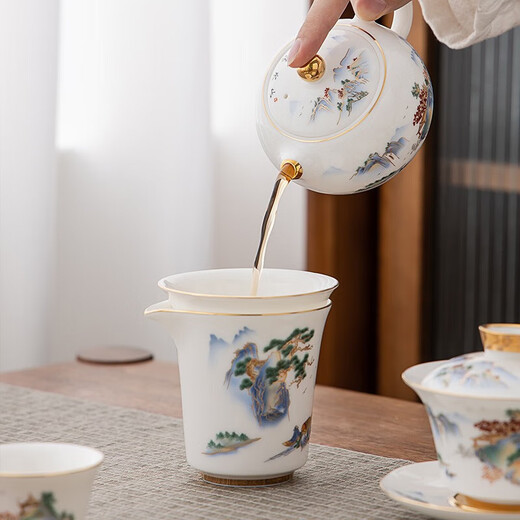 Large gold inlaid jade mutton fat jade porcelain tea set complete set of white porcelain Kung Fu tea set gift box Shanshui Qingyin