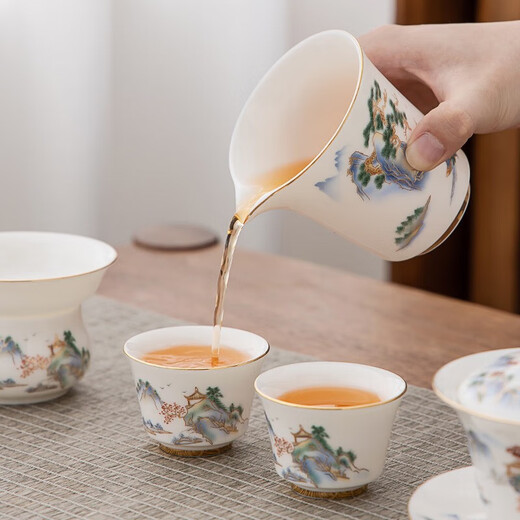 Large gold inlaid jade mutton fat jade porcelain tea set complete set of white porcelain Kung Fu tea set gift box Shanshui Qingyin