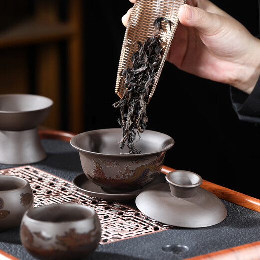 Oein changes color when heated, purple sand kung fu tea set, dragon and phoenix Chengxiang complete tea making set, household raw mineral mud teapot, teacup set, teapot cover bowl 12 pieces + tea ceremony