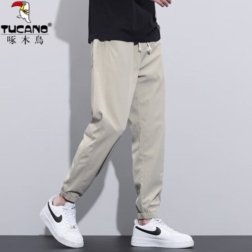 Pantalones informales delgados de seda de pájaros carpinteros para hombres en verano pantalones de harén de pie fríos y transpirables para hombres pantalones de sueño de tiempo deportivo suelto 5985 Light caki delgado M [sugerido 90-110jin [Jin iguala 0.5 kg] desgaste]