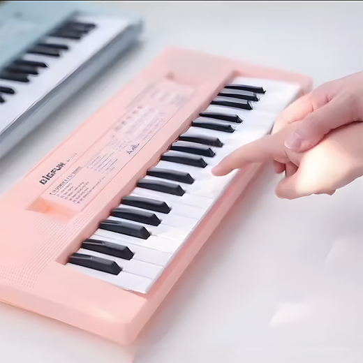 Piano électronique d'entrée de gamme pour les débutants pour enfants 37 touches peuvent jouer des instruments de musique 61 clés pour les jouets de musique à domicile pour garçons et filles 37 clés Pink Piano [ensemble 4 pièces de mise à niveau de mise à niveau]