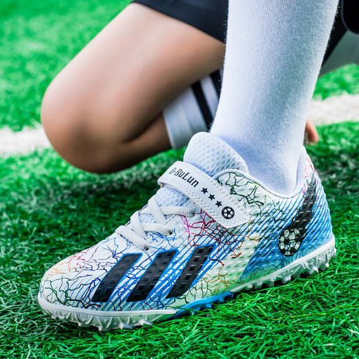 iosn mandarin duck football shoes new falcon children boy elementary school student assassin velcro broken nails football training shoes 6199 black and blue broken nails [buy one five] 31