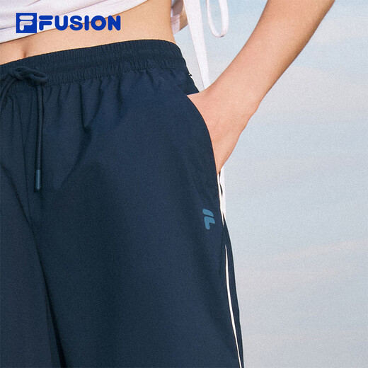 FILA FUSION斐乐潮牌梭织长裤女2025秋新款时尚宽松伞兵裤休闲裤 宝石深蓝-DB S 160/62A/S