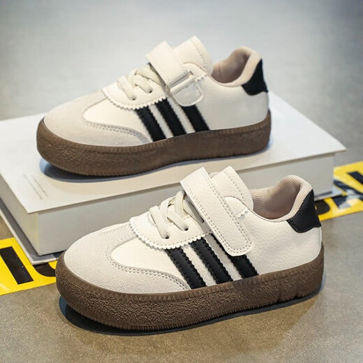 Zapatos de entrenamiento moral infantil primavera y otoño nuevos zapatos deportivos zapatos de tablero casual zapatos casuales zapatos blancos de niñas