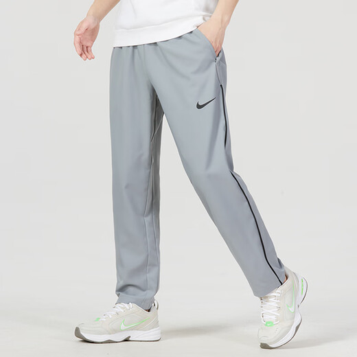 Pantalon de survêtement Nike (Nike) Pantalon pour hommes Summer Souffle à séchage rapide Pantalon de glace Pantalon à jambes droits Straitement Pantalon Men Tendance officielle Authentique DM6627-073_GRAY MODÈLE DE LEG STRIEUX_BREATABLE MBEATABLE M