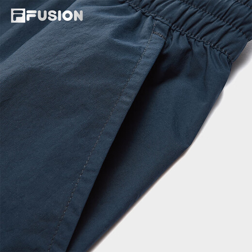 FILA FUSION斐乐潮牌梭织长裤女2025秋新款时尚宽松伞兵裤休闲裤 宝石深蓝-DB S 160/62A/S