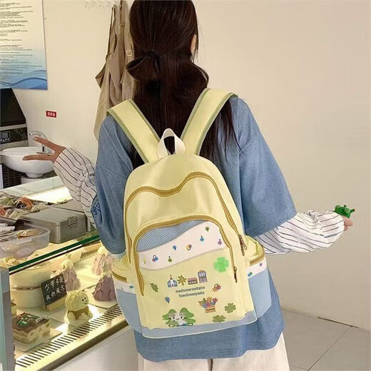 
Japanese cute ins style cat backpack niche high-value contrasting schoolbag junior high school girl breasts backpack yellow cartoon cat