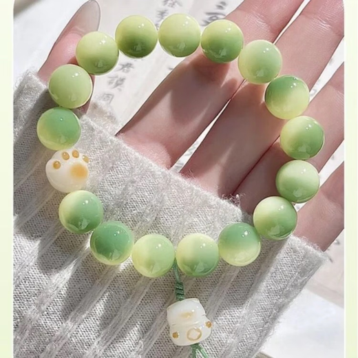 Drunken Little Lime Cat Green Bracelet in front of Flowers Cat Claw Handheld High-Look Bracelet Birthday Gift for Girlfriend and Best Friend 1 Cat Claw Lucky Cat Bracelet