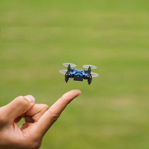 Mini pliage de photographies aériennes de drones Avions à distance de télécommande d'entrée de gamme Entrée de télécommande pour les élèves des écoles primaires. Le drone à bagages n'a pas de caméra. 1 batterie + 1 câble de charge + sac d'accessoires.