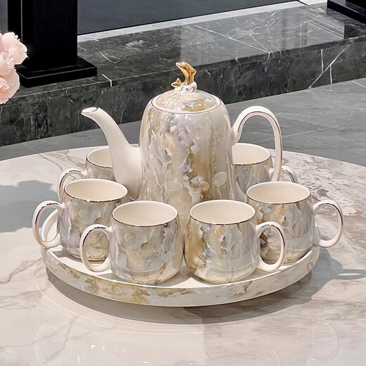 Light luxury high-end tea set 2025 new ceramic water cup teapot teacup home living room hospitality wedding gift warm yellow stone pattern dolphin tea set gift box set