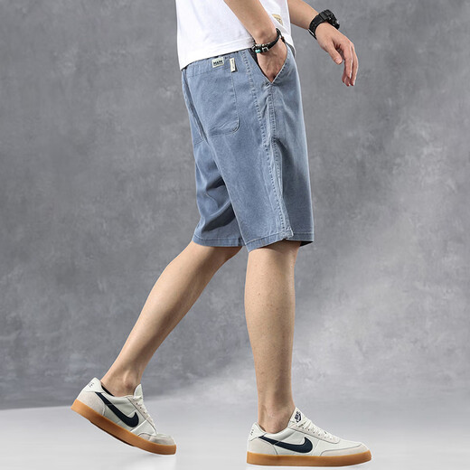 Mark Waffe Denim Shorts Pantalon de cinq points pour hommes pantalons larges à jambes larges et à la mode de glace à la mode.