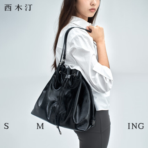 西木汀 相约 黑色水桶包2025新款双肩包女上班通勤包包大容量 深邃黑 无规格