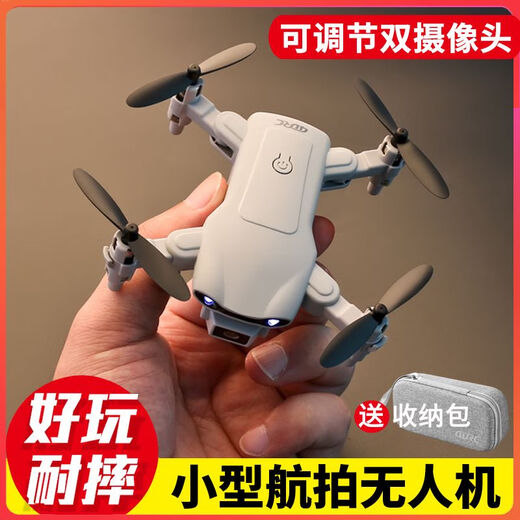 Drone mini aerial quadcopter primary school students remote control aircraft entry-level children's toy helicopter without aerial photography protection flight black 4 batteries broken and replaced with new + remote control battery + easy damage