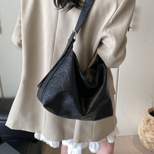 Les sacs populaires de cette année pour les femmes 2025 Nouveau conception de niche rétro de conception de banlieue sac fourre-tout