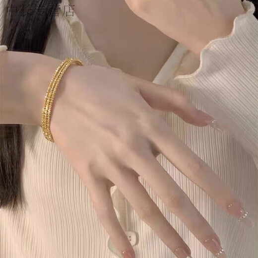 He Jiagong Lao Phoenix 999 gold pure gold Sansheng III bouncy bead elastic bracelet Internet celebrity multi-layer design bracelet high security