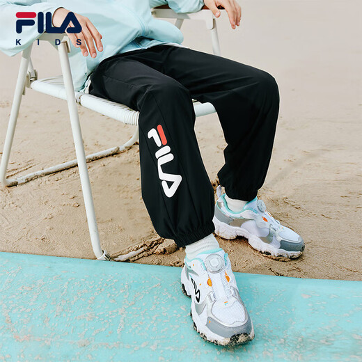 Fila [pantalon de vent spirituel] File des pantalons répulsifs de moustique pour enfants 2025 Pantalon de sport sécheur rapide à nouveau style cool pour hommes et filles
