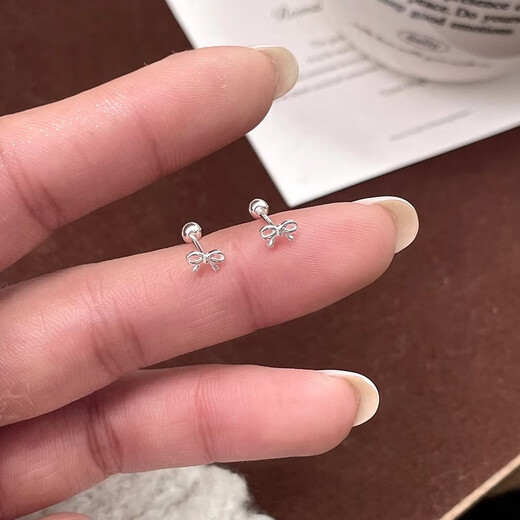 Xinshe S999 sterling silver earrings for women mini bow pure silver ear piercing 2025 new style sleeping-free earrings for women a pair of mini bow earrings
