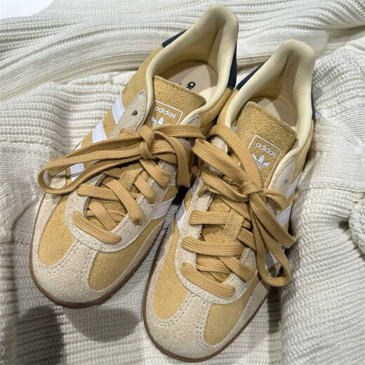 Adidas (Adidas) Kleeschuhe Herren- und Frauenschuhe Neue Gazelle Deutsche Trainingschuhe leichte Sportgewichte atmungsaktiven lässigen Freizeitschuhen Ji3523/Hafer Farbe/Weiß/Hidden Blue 38 (235 mm)