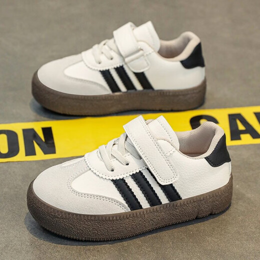 Zapatos de entrenamiento moral infantil primavera y otoño nuevos zapatos deportivos zapatos de tablero casual zapatos casuales zapatos blancos de niñas