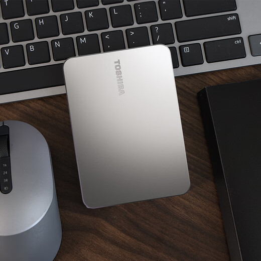 Die mobile Festplatte FLEX von Toshiba (TOSHIBA) eignet sich für mobile Festplatten von Apple-Computern, Spezialfestplatten für Mac-Computer, Hochgeschwindigkeitsübertragung, externe Festplatten, mit TYPE-C-Datenkabel, mobile Festplatte + Silikonhülle, rutschfest, kratzfest, gut für die Wärmeableitung, 2 TB