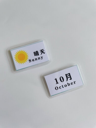 Semana del clima infantil Cognición emocional Calendario tranquilo Calendario chino e inglés Pasta de juguete Patinas de ayuda de enseñanza A4 Tamaño pequeño Calendario Terminado Cubierta de plástico