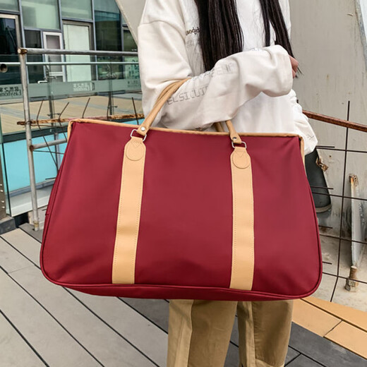 布潮喵时尚外出短途旅行包女手提包男大容量行李包防水可套拉杆旅行袋 黑色[加厚防水版可套拉杆] 大号[42升]