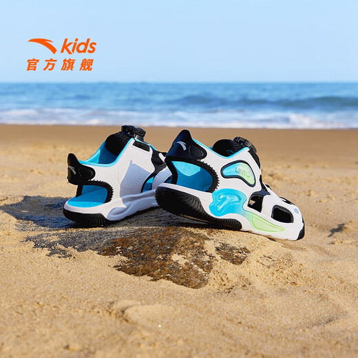 ANTA Children's Sandals Men's and Women's Shoes 2025 Summer New Jellyfish Knob Outdoor Baotou Beach Shoes Boys Anta White/Black 9970H-2 31