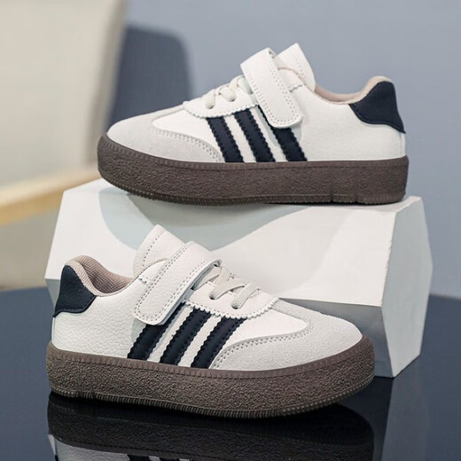Zapatos de entrenamiento moral infantil primavera y otoño nuevos zapatos deportivos zapatos de tablero casual zapatos casuales zapatos blancos de niñas