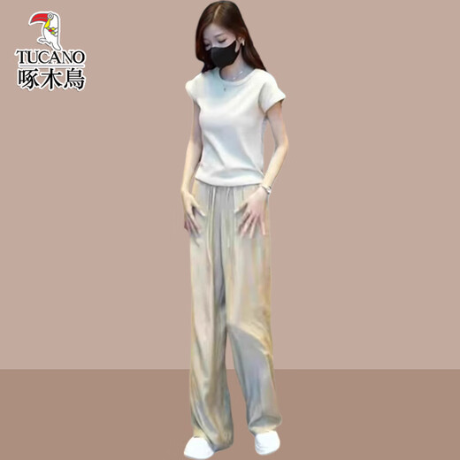 Woodpecker-Sommer-Outfit mit einem kompletten Satz modischer Internet-Celebrity Street-Modetrends in diesem Jahr, die beliebten Slim-T-Shirts dieses Jahres, zweiteilige Aprikosen-Farbhose M.