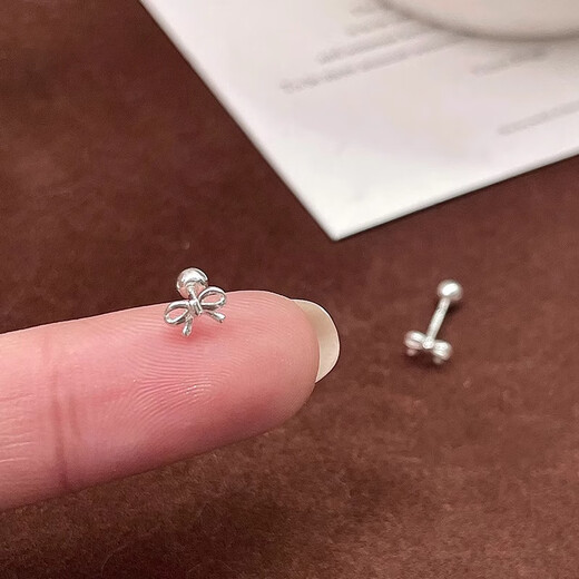 Xinshe S999 sterling silver earrings for women mini bow pure silver ear piercing 2025 new style sleeping-free earrings for women a pair of mini bow earrings