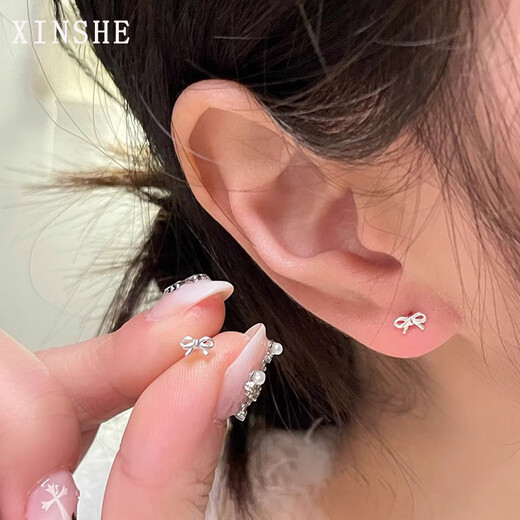 Xinshe S999 sterling silver earrings for women mini bow pure silver ear piercing 2025 new style sleeping-free earrings for women a pair of mini bow earrings