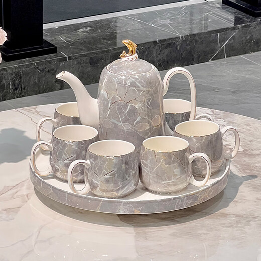 Light luxury high-end tea set 2025 new ceramic water cup teapot teacup home living room hospitality wedding gift warm yellow stone pattern dolphin tea set gift box set