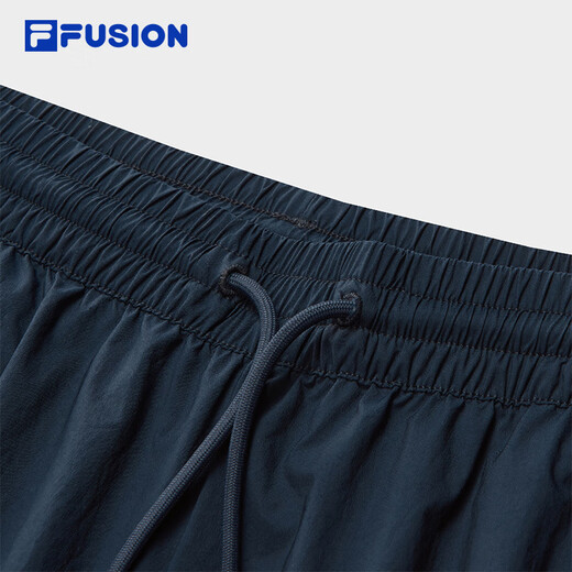 FILA FUSION斐乐潮牌梭织长裤女2025秋新款时尚宽松伞兵裤休闲裤 宝石深蓝-DB S 160/62A/S