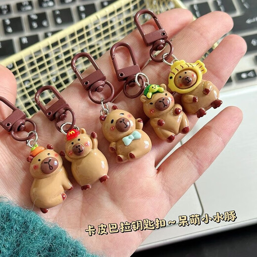 Mignon Kapibala Keychain Pendant Student Schoolbag Cartoon Hanging Ornement Girl Accessoires Accessoires pour le meilleur ami 3 forfaits (modèle aléatoire)