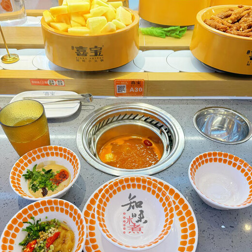A complete set of commercial self-service rotating small hot pot equipment for boiling, spicy, hot, sushi, and grilling all-in-one rotating small hot pot