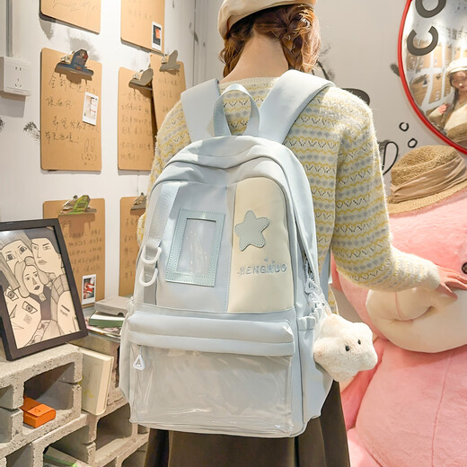 Xinmu school bag for junior high school students, large-capacity backpack for class and travel, college ins versatile primary school student backpack, blue, three random badges + 1 card (star pendant)